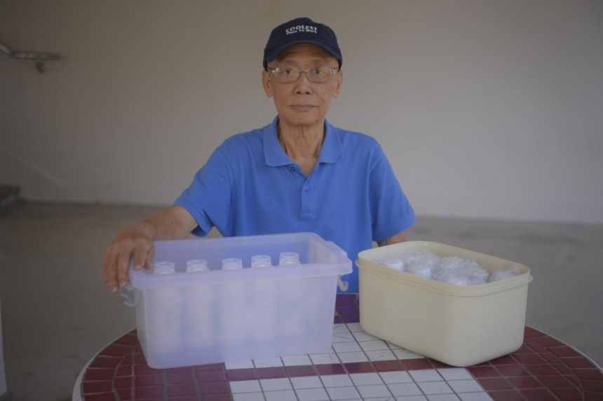  ​Retiree Lee Meow Khin with his medicine delivered to his home.ST PHOTO MARK CHEONG
